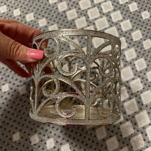 NWOT. Never used. Perfect condition. Silver with shiny glitter. Candle holder.
